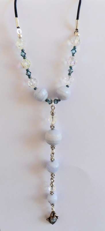Blue topaz, blue lace agate, Swarovski crystal and leather pendant
